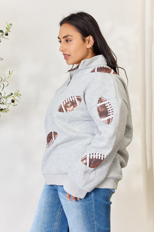 Double Take Full Size Sequin Football Half Zip Long Sleeve Sweatshirt